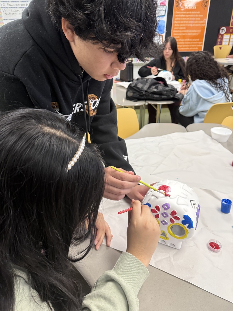 students working on their ofrenda competition