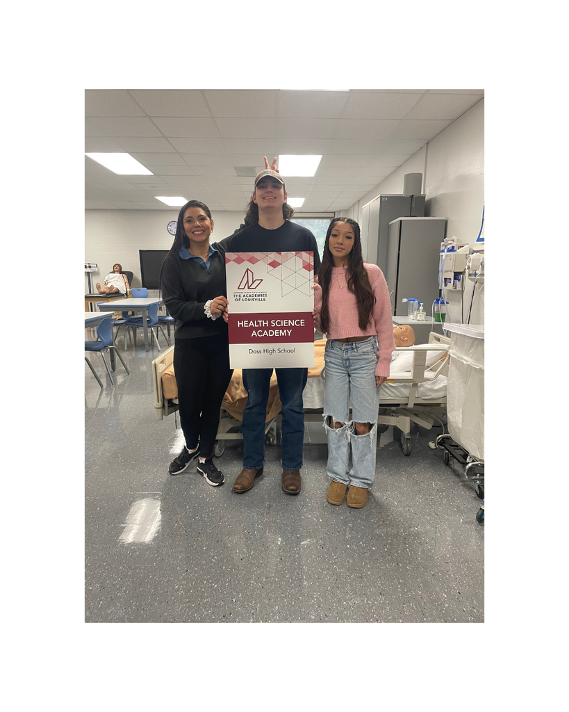 students winning student of the month recognition with health sciences assistant principal