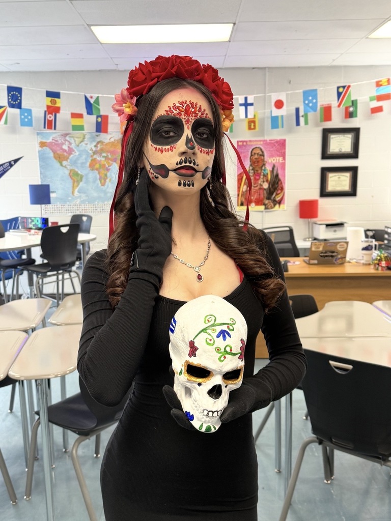student in catrina makeup