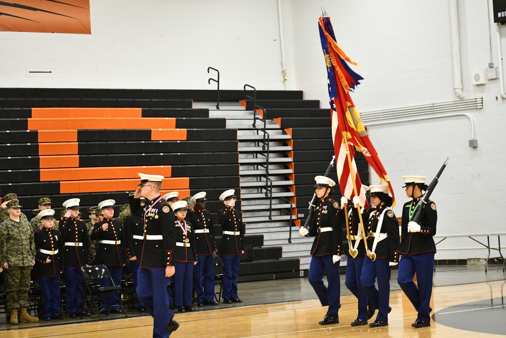 MCJROTC processes in during a ceremony.