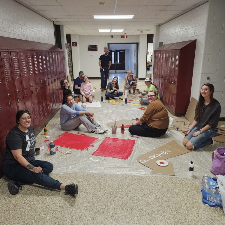 teachers painting in hallway