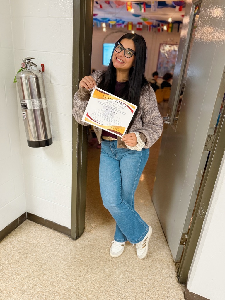 Ms. Beitia with certificate