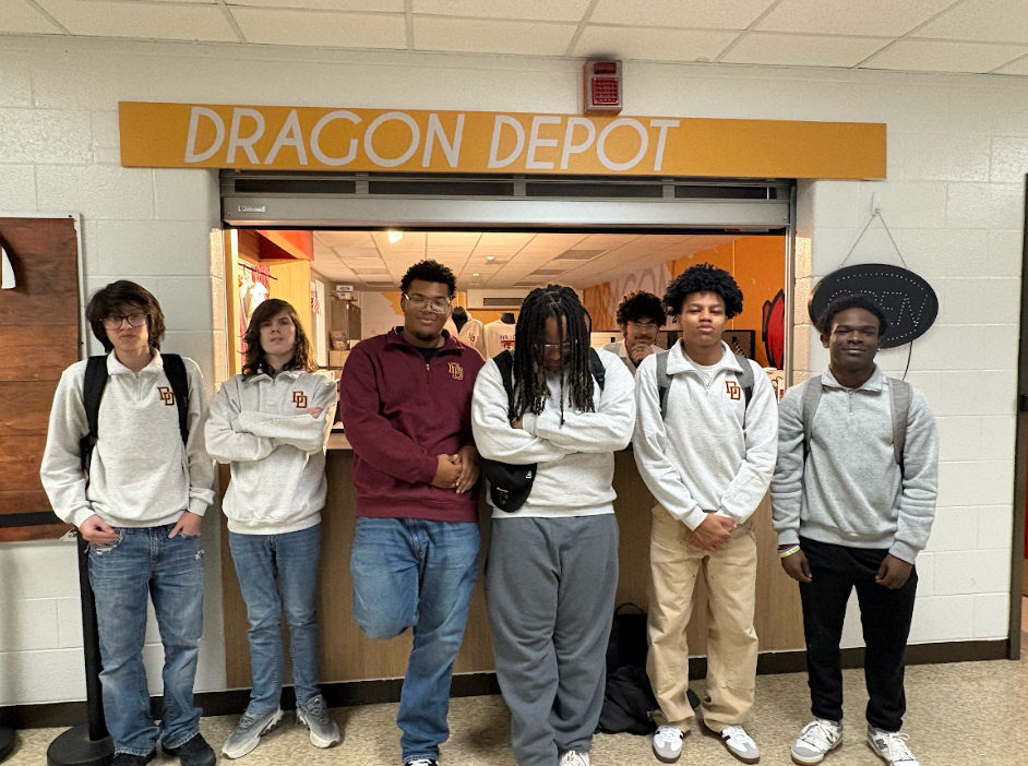 students in quarter zips outside Dragon Depot