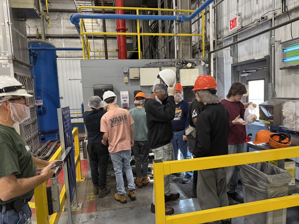 students inside Reynolds Wrap plant
