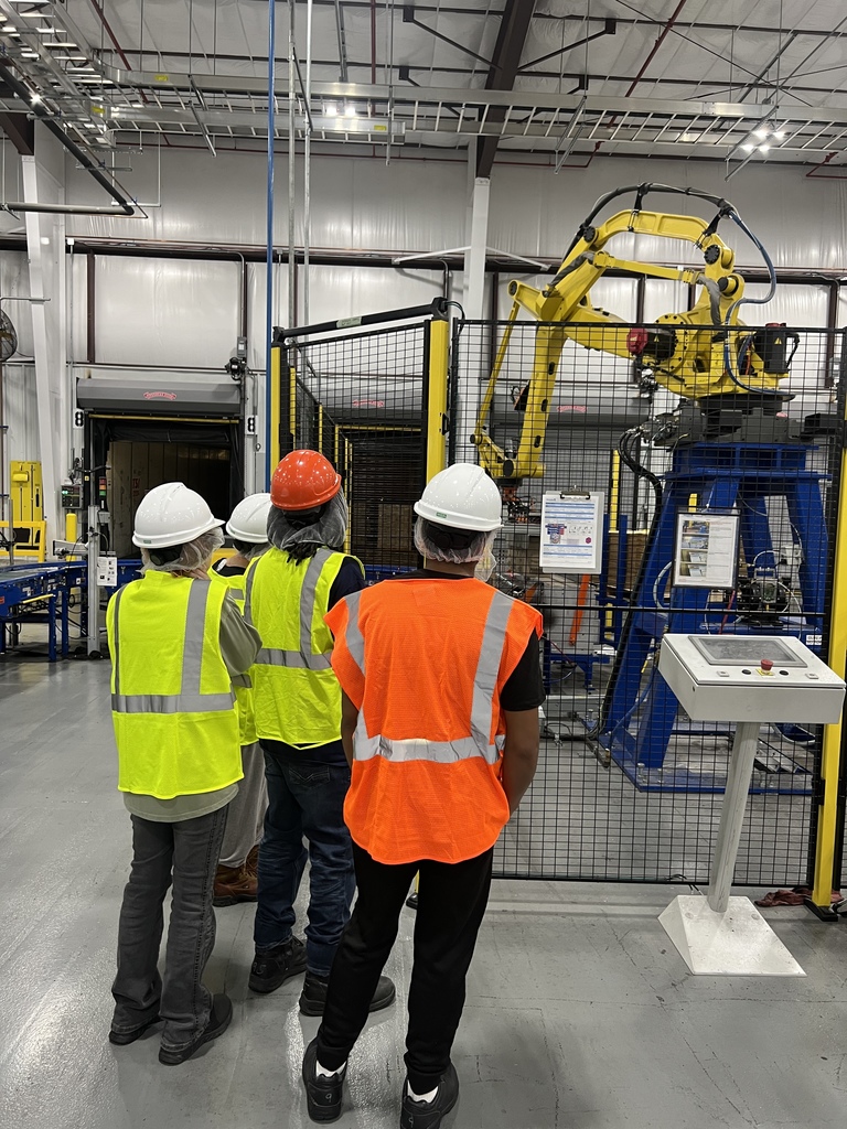 students inside Reynolds Wrap plant