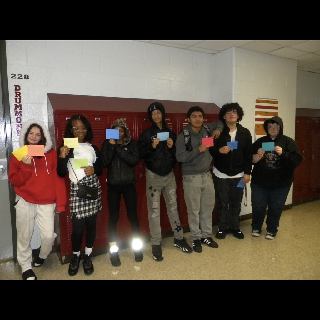 students with cards