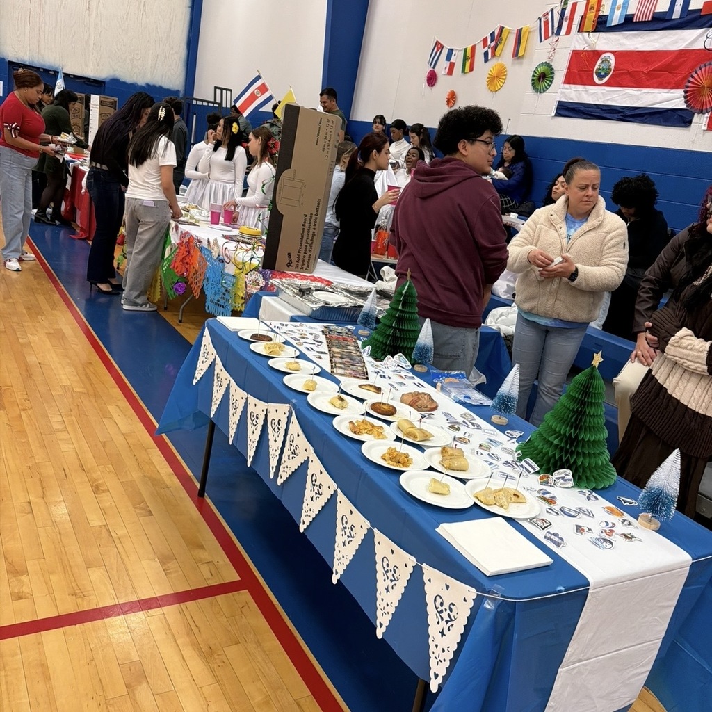students and staff at Latin Christmas event