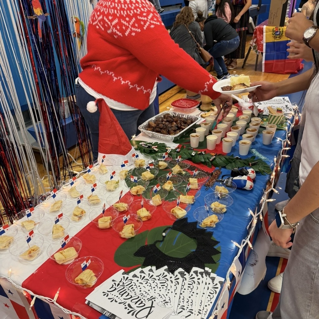 students and staff at Latin Christmas event