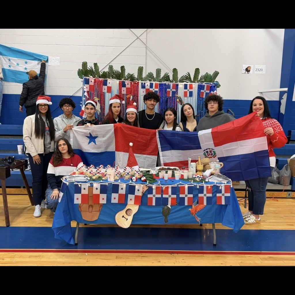 students and staff at Latin Christmas event