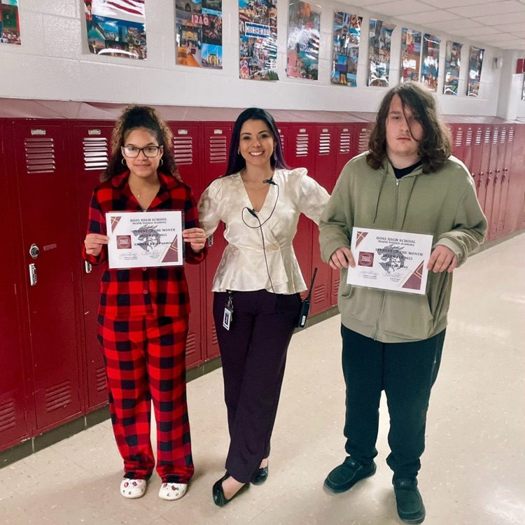 Dr. Johana Gomez, Health Sciences Principal, with December students of the month