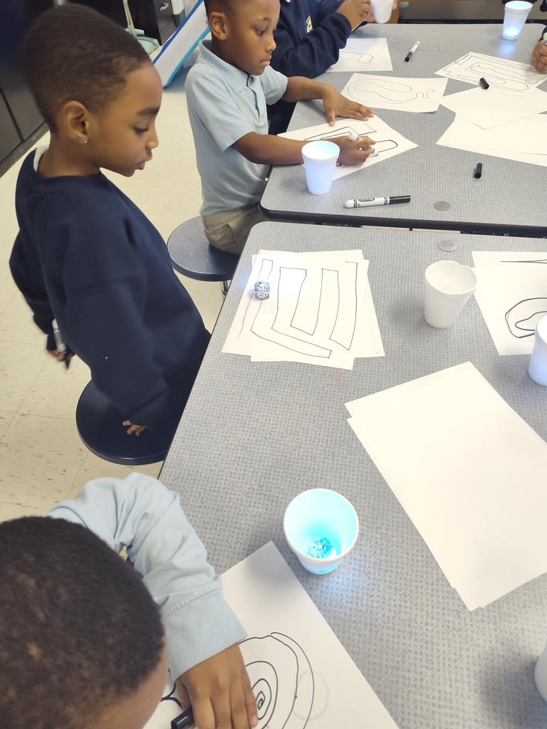 students exploring with ozobots