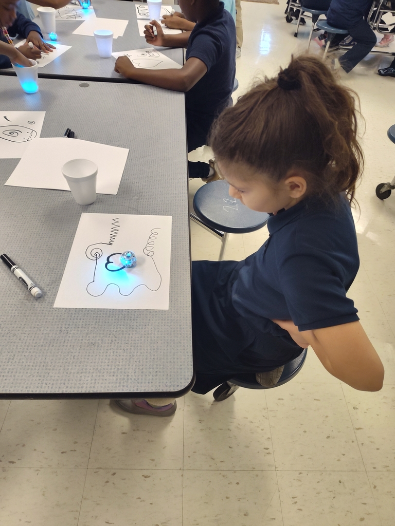 students exploring with ozobots