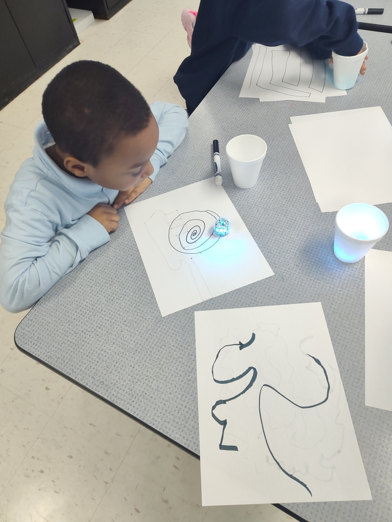 students exploring with ozobots