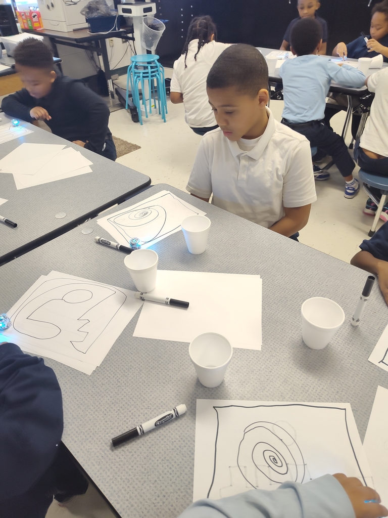 students exploring with ozobots