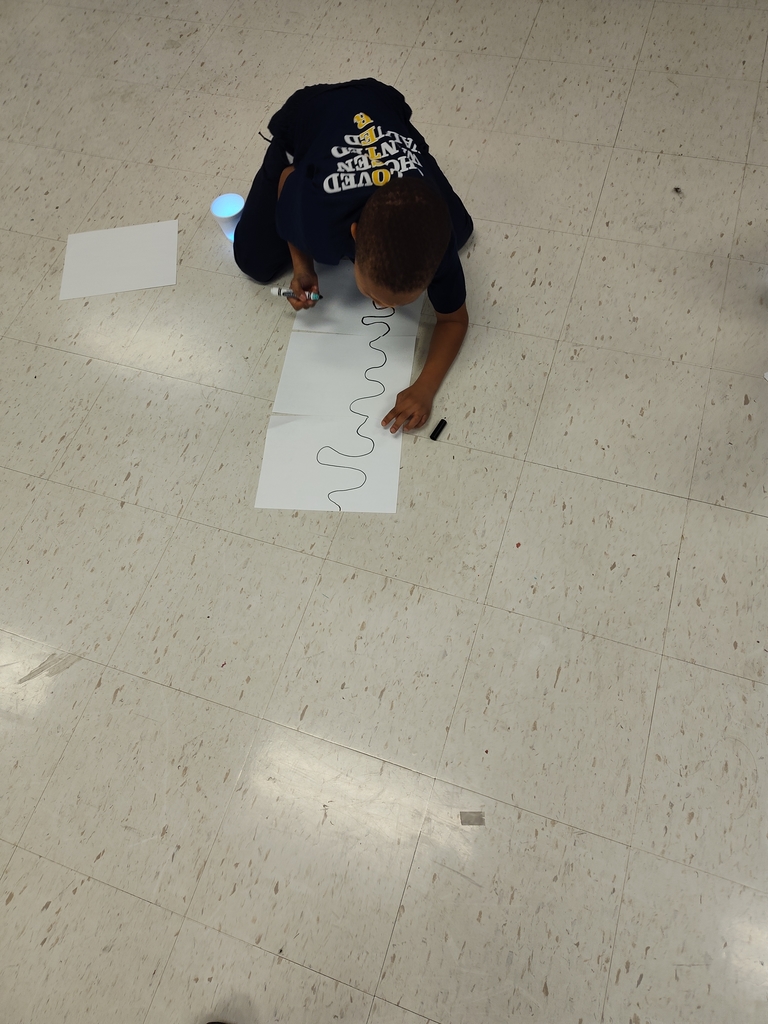 kindergarteners playing with ozobots 