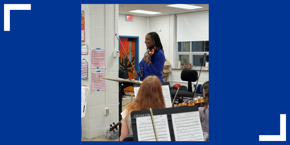 Photo of orchestra teacher in classroom