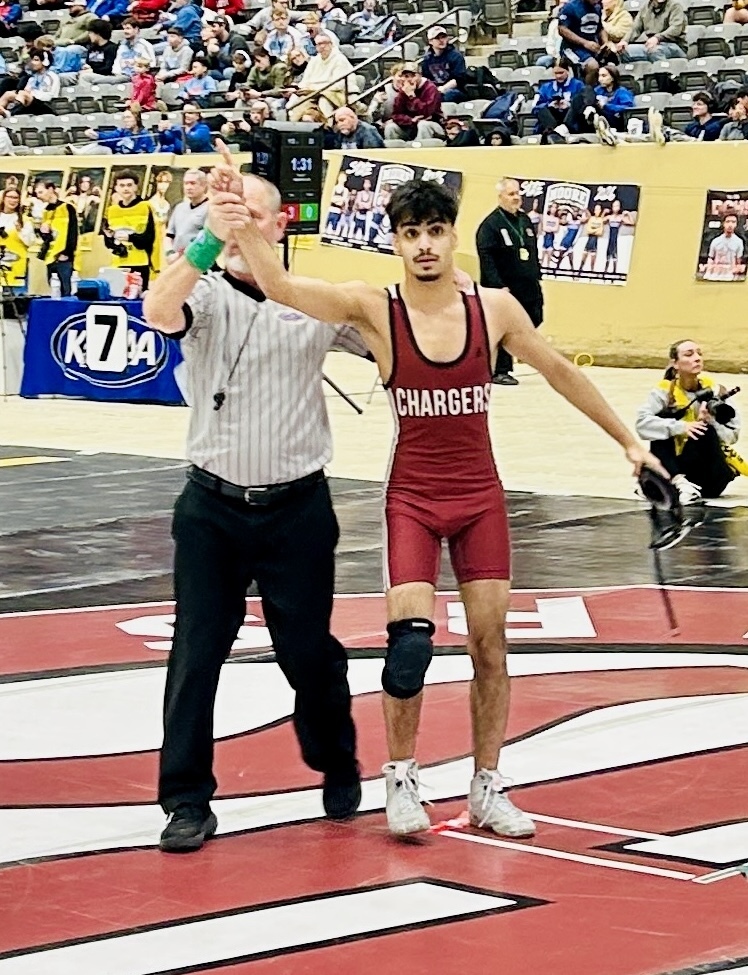 Starting the state tournament with a WIN! 🚨 🤼‍♂️  A huge congratulations to Ahmed Alobaidi for securing his first victory at the KHSAA State Wrestling Tournament! Making it even sweeter—he took the "W" on our brand-new custom wrestling mat. Talk about breaking it in the right way! 🏆🔥  The action is just getting started. Stay tuned as Andrew Cundiff, Ali Arslanov, and Elijah Blais take the mat later today. Let’s keep that momentum rolling! 💪😤