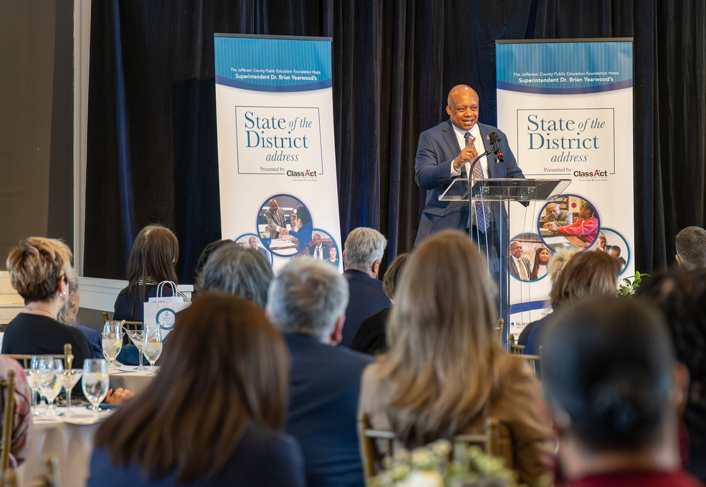 Dr. Yearwood speaks at a podium.