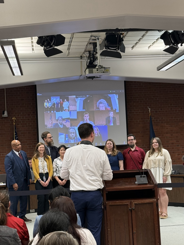 teachers at board meeting