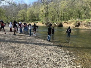 Students in Floyds Fork catching fish