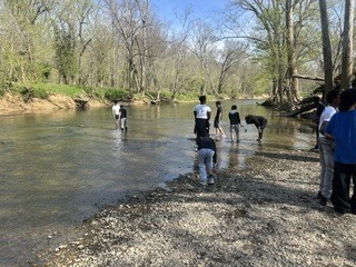 Students in Floyds Fork catching fish