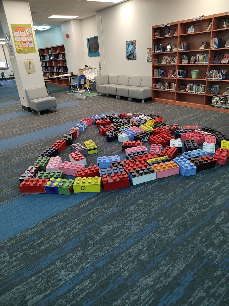 Heart built out of enlarged cardboard Legos which were made by art students at Johnson