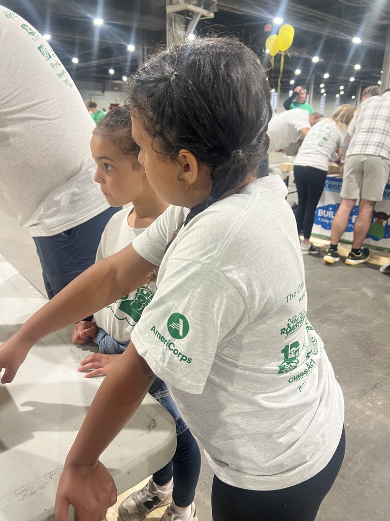 Volunteers participate in the Build-A-Bed event.