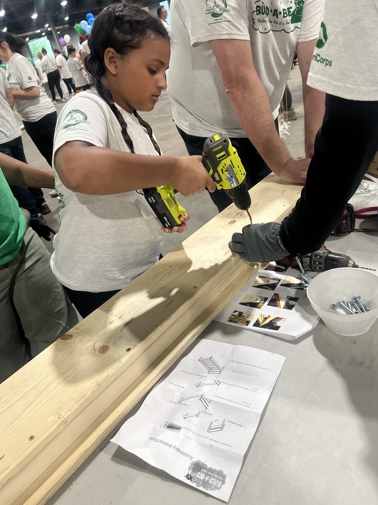 Volunteers participate in the Build-A-Bed event.