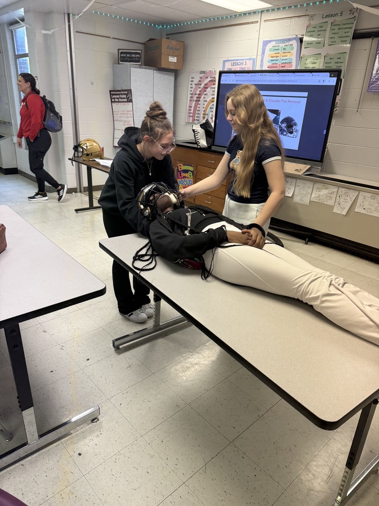 Bringing the field to the classroom! 🏥🏈  A huge thank you to UofL Health Sports Medicine for visiting our Allied Health students recently! It was an incredible day of learning that bridged the gap between the sidelines and the clinic.  Our students took a deep dive into:  🏃 Career Paths: Exploring the diverse opportunities within the world of Sports Medicine.  🤝 Collaboration: Learning how athletic trainers work hand-in-hand with physical therapists, surgeons, and other healthcare specialists.  👣 Shadowing: Discussing real-world opportunities to see healthcare in action.  The highlight of the day was the hands-on lab, where students practiced the critical skills of managing sideline C-spine injuries and safe equipment removal. Learning how to stabilize an athlete in those high-pressure moments is a vital skill for any future healthcare professional!