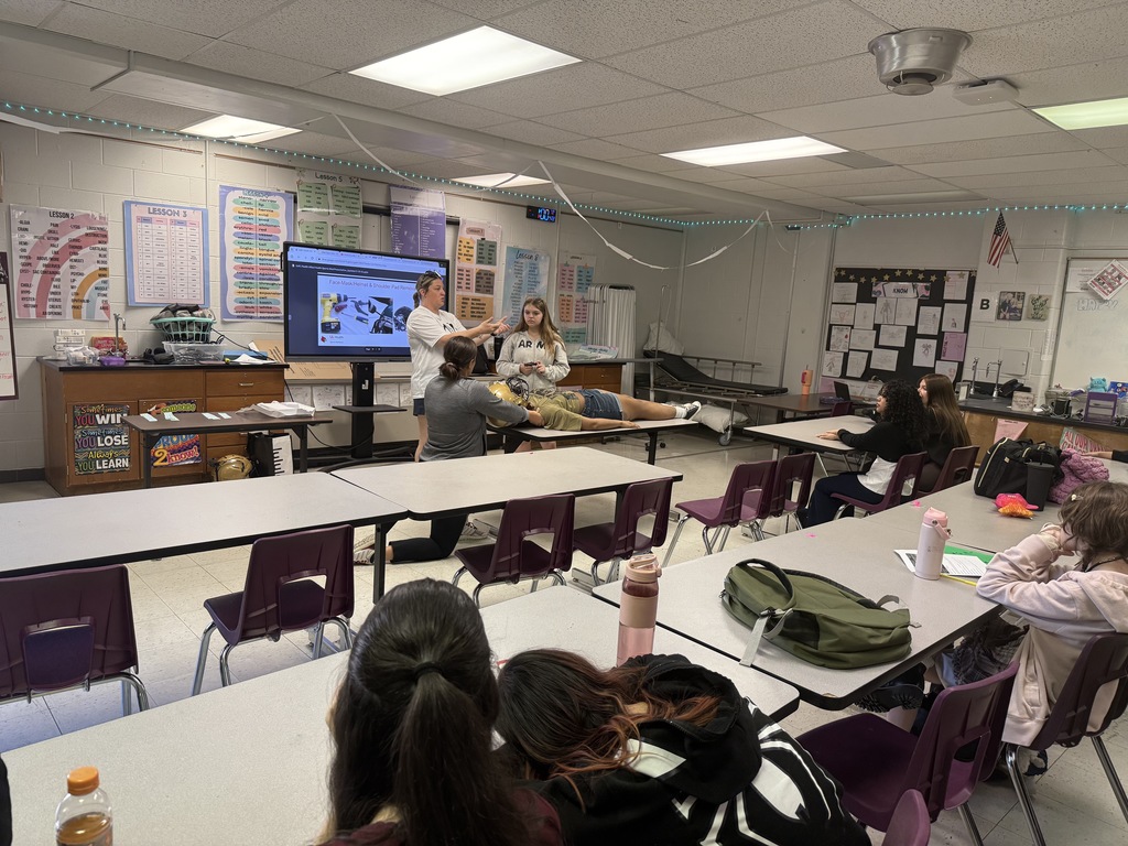 Bringing the field to the classroom! 🏥🏈  A huge thank you to UofL Health Sports Medicine for visiting our Allied Health students recently! It was an incredible day of learning that bridged the gap between the sidelines and the clinic.  Our students took a deep dive into:  🏃 Career Paths: Exploring the diverse opportunities within the world of Sports Medicine.  🤝 Collaboration: Learning how athletic trainers work hand-in-hand with physical therapists, surgeons, and other healthcare specialists.  👣 Shadowing: Discussing real-world opportunities to see healthcare in action.  The highlight of the day was the hands-on lab, where students practiced the critical skills of managing sideline C-spine injuries and safe equipment removal. Learning how to stabilize an athlete in those high-pressure moments is a vital skill for any future healthcare professional!