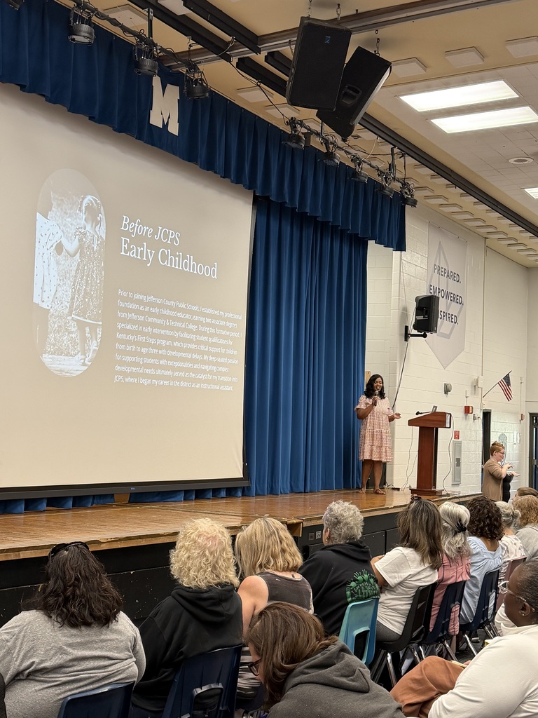 Adults participate in a professional development session.