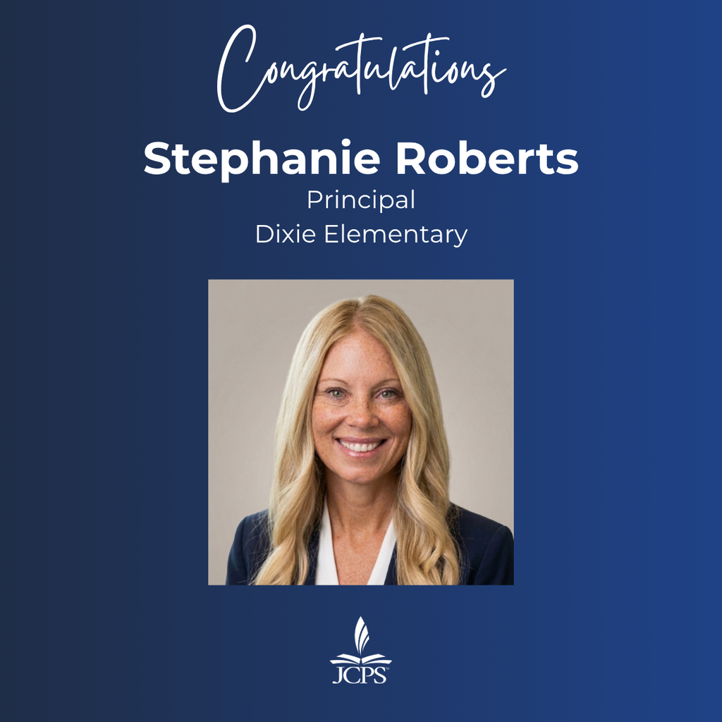 A graphic on a dark blue background that reads "Congratulations Stephanie Roberts, Principal, Dixie Elementary." To the right is a square headshot of Stephanie Roberts, a smiling woman with long blonde hair, wearing a dark blazer over a white top. The white JCPS logo is located at the bottom.