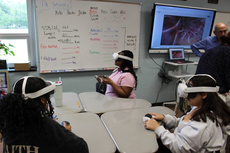 student with vr headset
