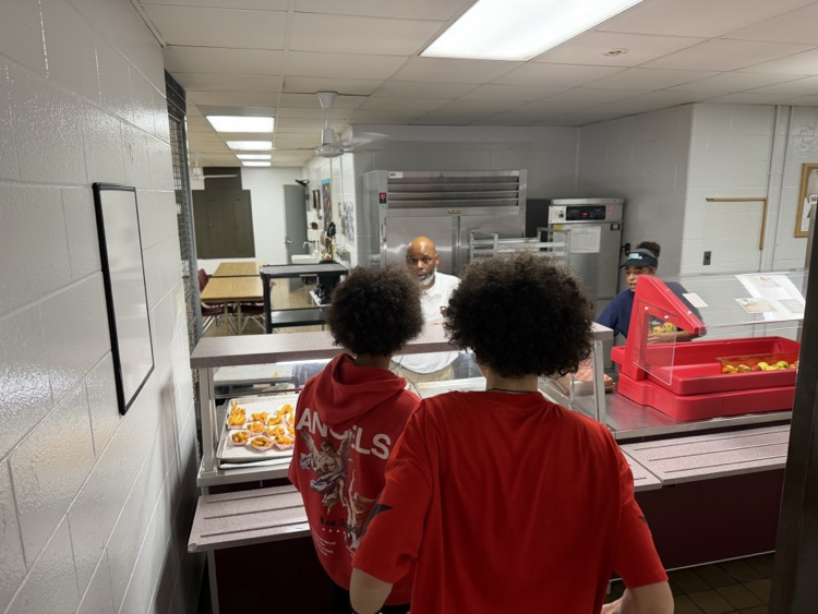 dr ellison serving lunch