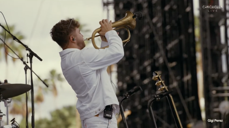 Nick Anthony plays the trumpet onstage at Coachella.