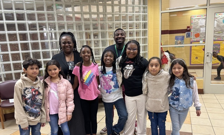teachers and students smiling
