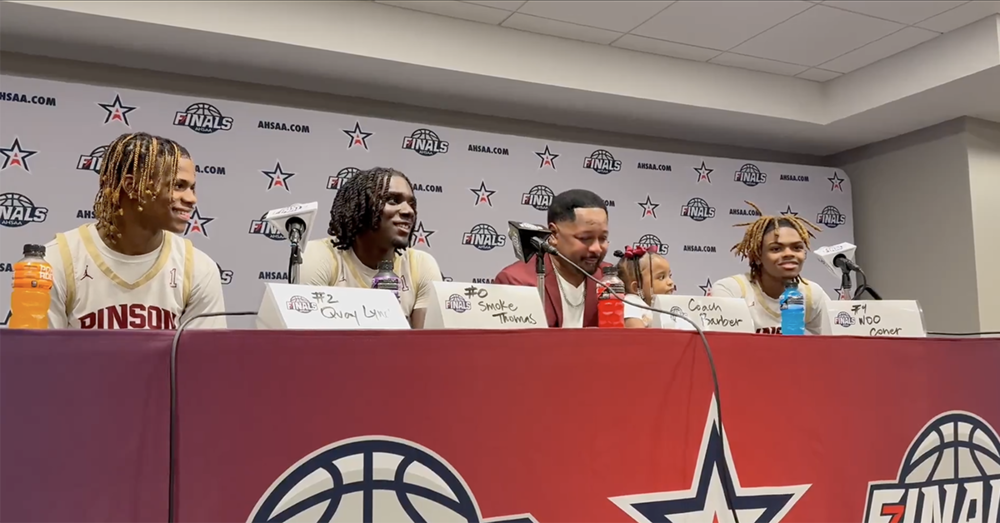 Pinson Valley High School Basketball Coach and players attending a press conference before the Class 6A Final Game.