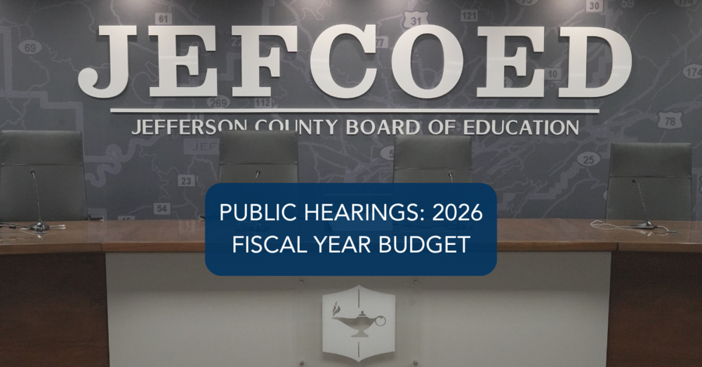 Graphic shows photo of Jefferson County Schools Board Room with text over photo that reads "PUBLIC HEARINGS: 2026 FISCAL YEAR BUDGET"