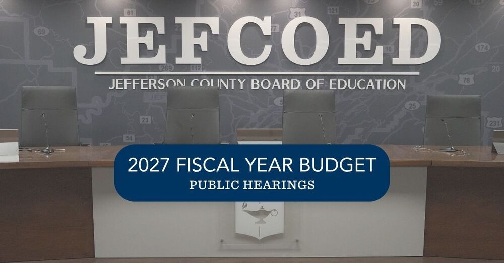 Graphic is an image of the Jefferson County Schools Board room with text attached that says "2027 Fiscal Year Budget Public Hearings."