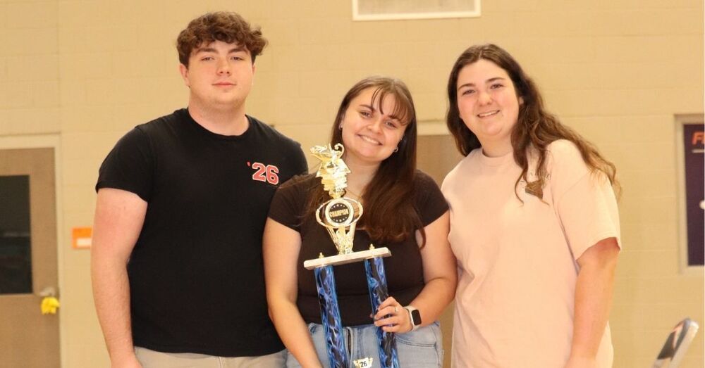 Oak Grove's Future Problem Solvers team poses for a photo with their trophy following the competition.