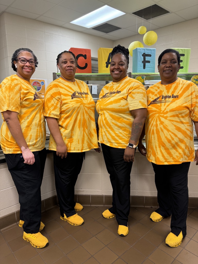 Four female workers smiling