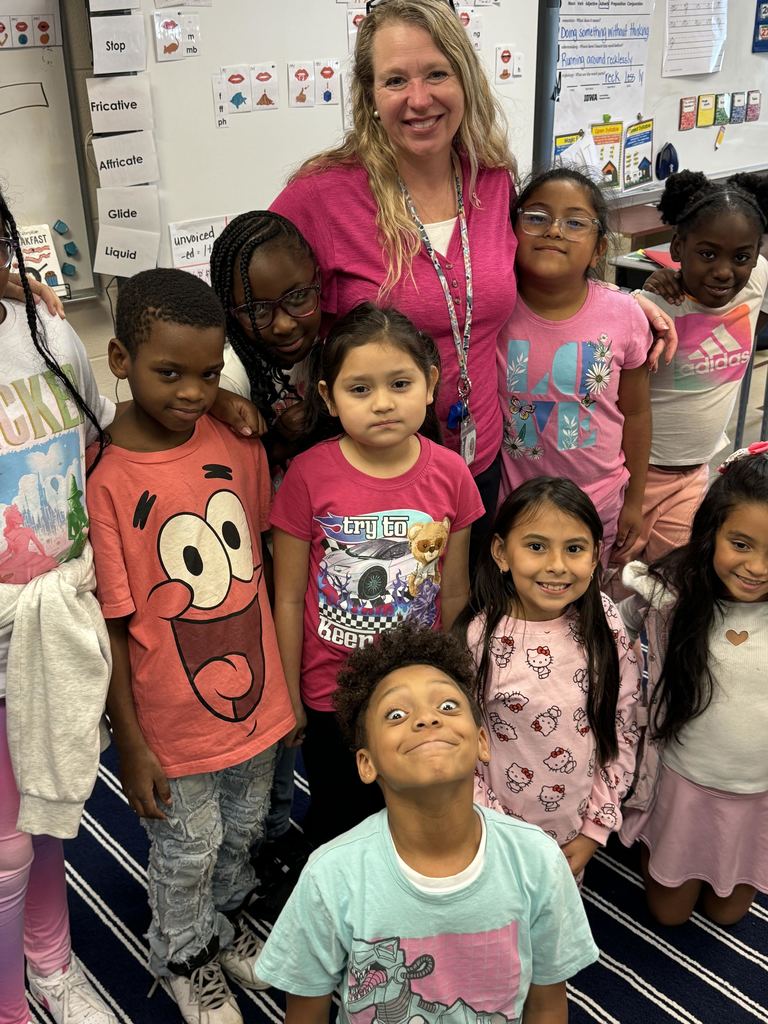 one steachers and her students smiling