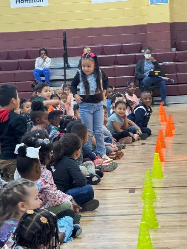 student standing in the audience