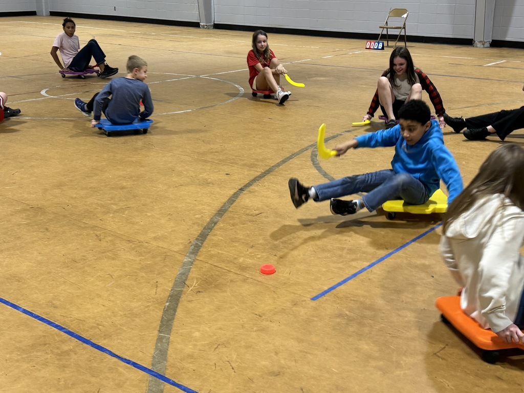4th and 5th graders playing scooter hockey4th and 5th graders playing scooter hockey