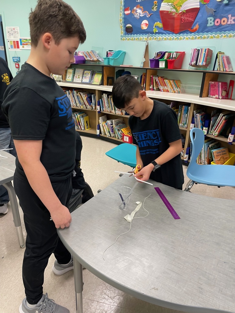 Science Olympians working on their events
