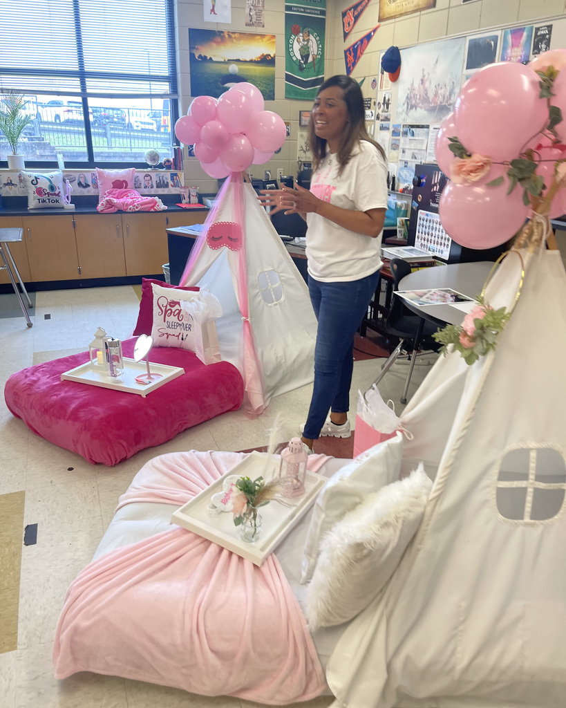 The Glampover - popular session at the McAdory Middle School Empowerment Summit. Features teepees with pink balloons and pink spa items.