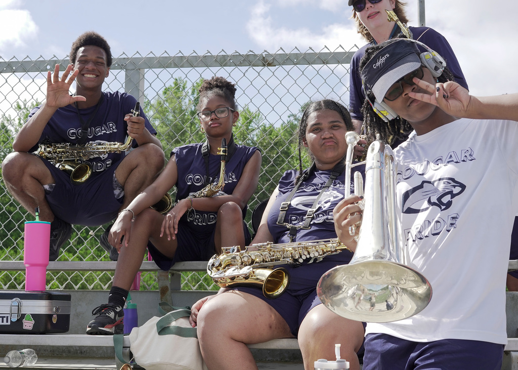 Students at Clay-Chalkville High School enjoying a break during practice.