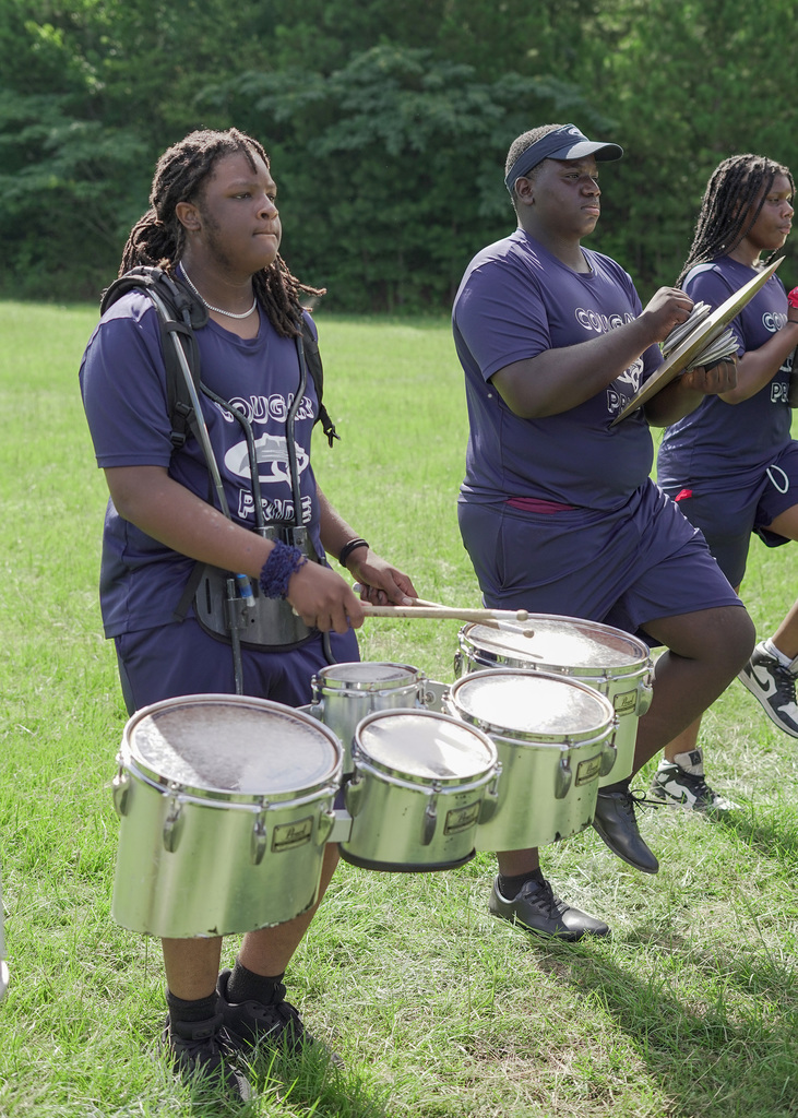 Drumline students practicing during summer band camp.