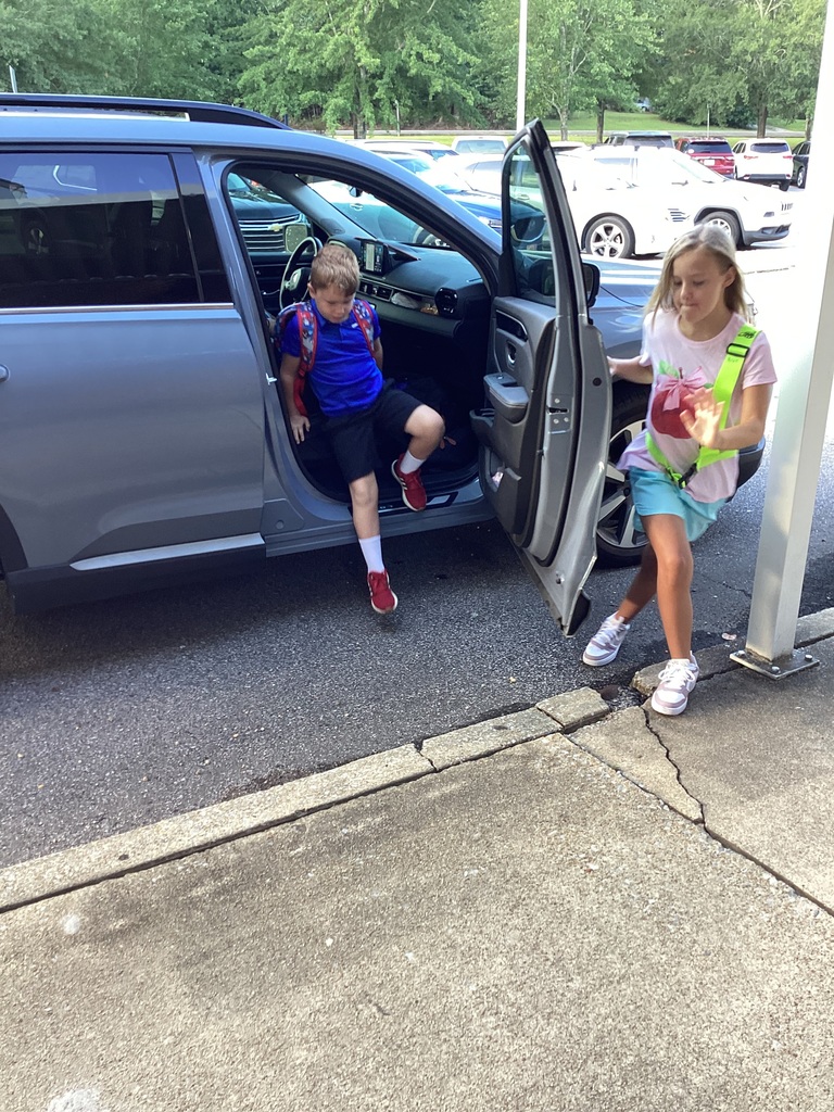 Student in carline on the first day of school