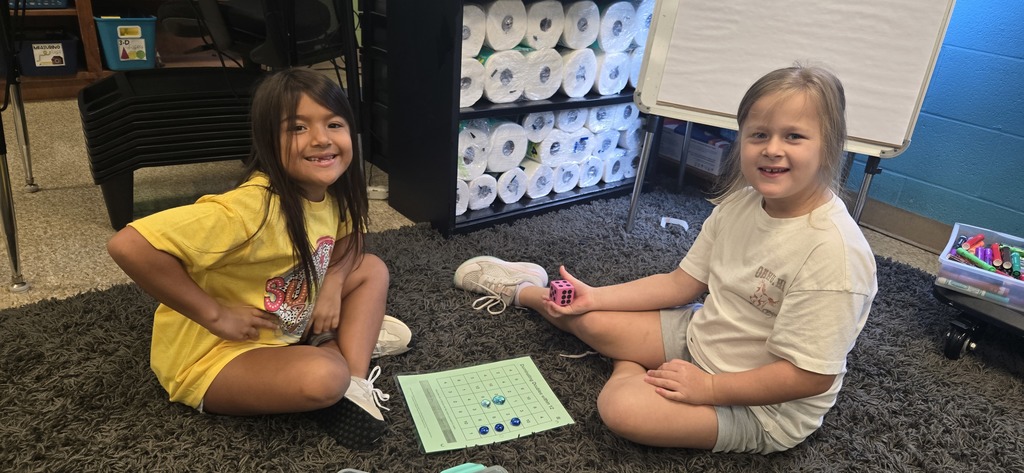 Second graders playing math games